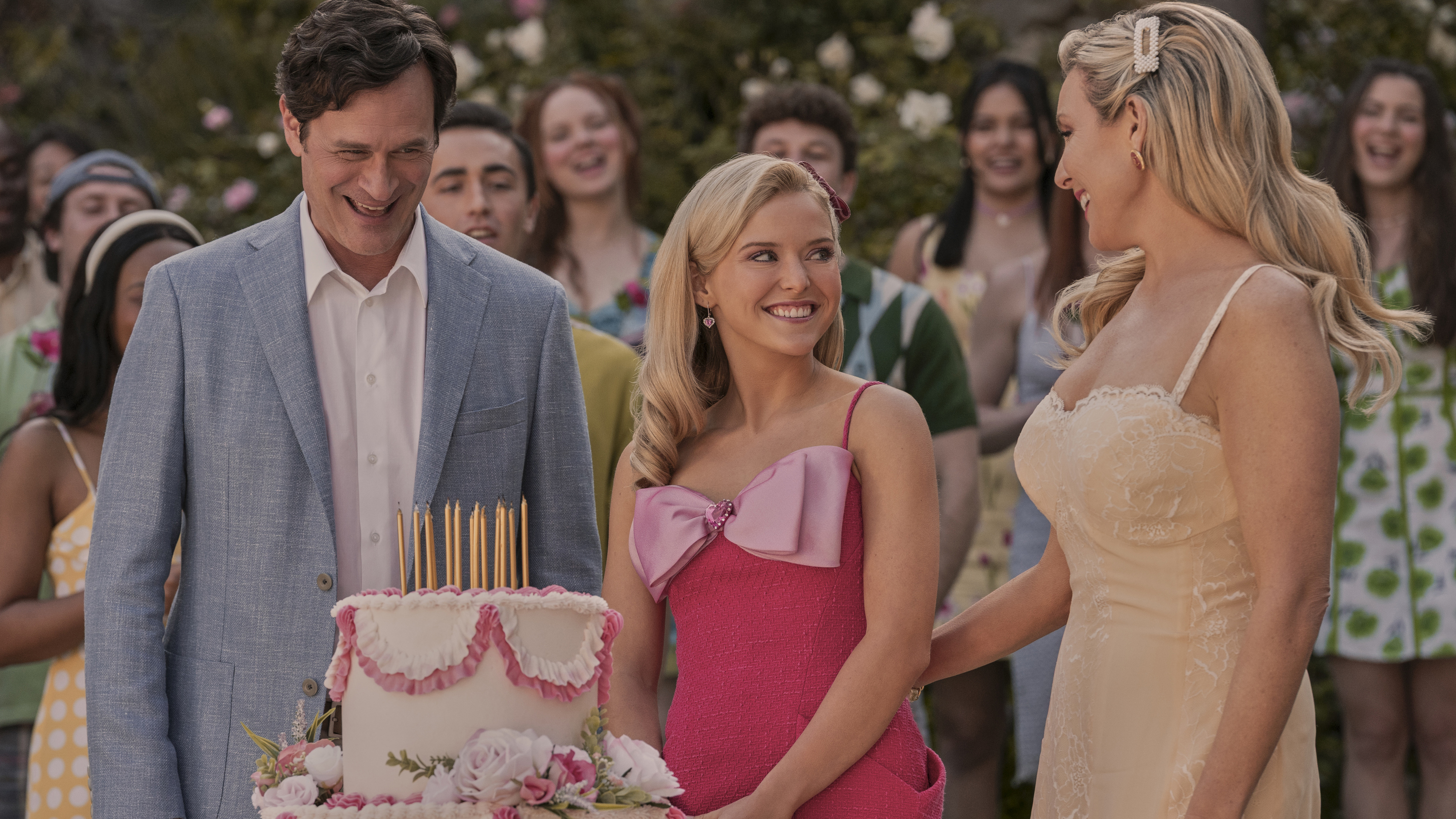 Tom Everett Scott, Lexi Minetree, and June Diane Raphael as the Woods family celebrating a birthday in Elle on Amazon Prime Video